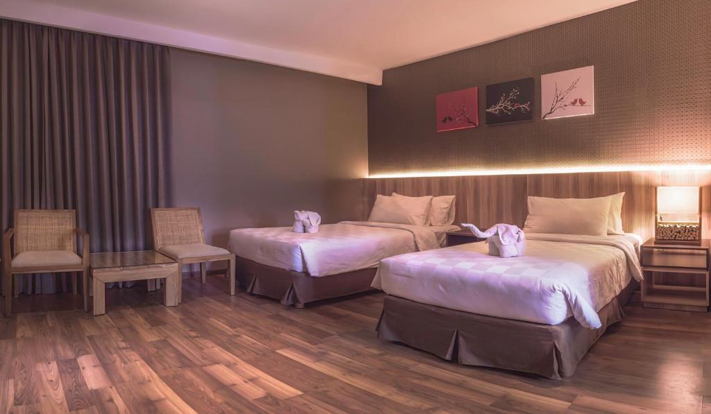 Oxville Hotel Паданг Стая снимка